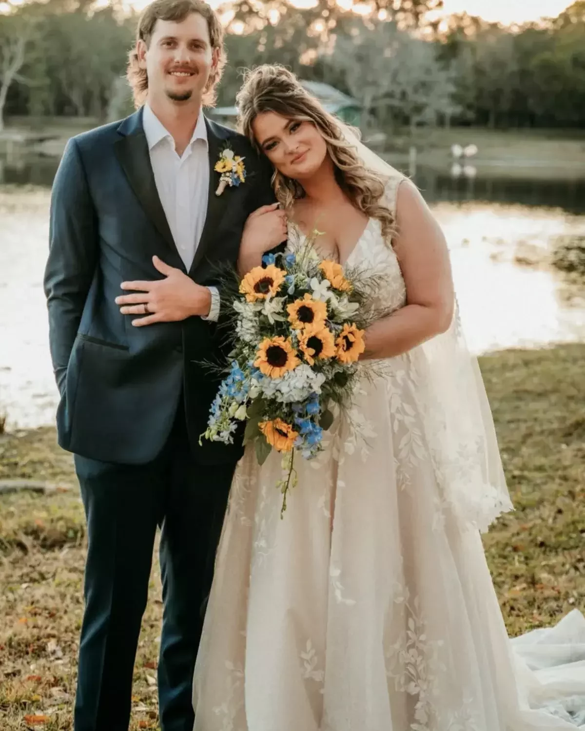 Cascading sunflower bridal bouquet at The Barn at Crescent Lake, a Tampa Bay wedding venue